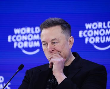 Elon Musk, chief executive officer of Tesla Inc., during the World Economic Forum (WEF) in Davos, Switzerland, on Thursday, Jan. 22, 2026. The annual Davos gathering of political leaders, top executives and celebrities runs from Jan. 19-23. Photographer: Krisztian Bocsi/Bloomberg